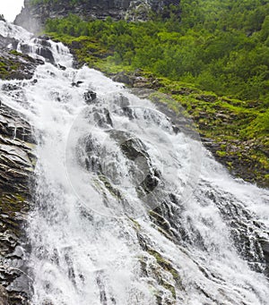 Beautiful Hjellefossen waterfall Utladalen Ã˜vre Å rdal Norway. Most beautiful landscapes